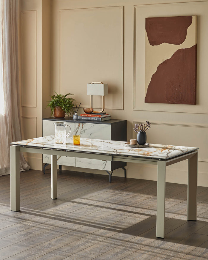 A dining room with a marble-topped table, sideboard, and a decorative painting on the wall.