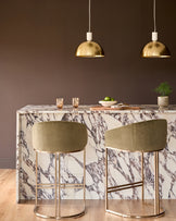 Louis single pendant lamp in brass finish with cream cord and dome-shaped shade, shown in interior setting.