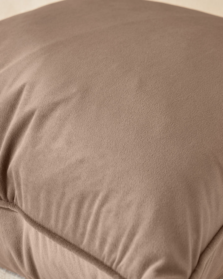 Luca rectangle cushion in mink, close-up showing soft fabric texture and gathered seam detail.