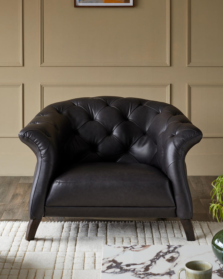A stylish, tufted leather armchair with a dark finish, adding a touch of sophistication to any living space.