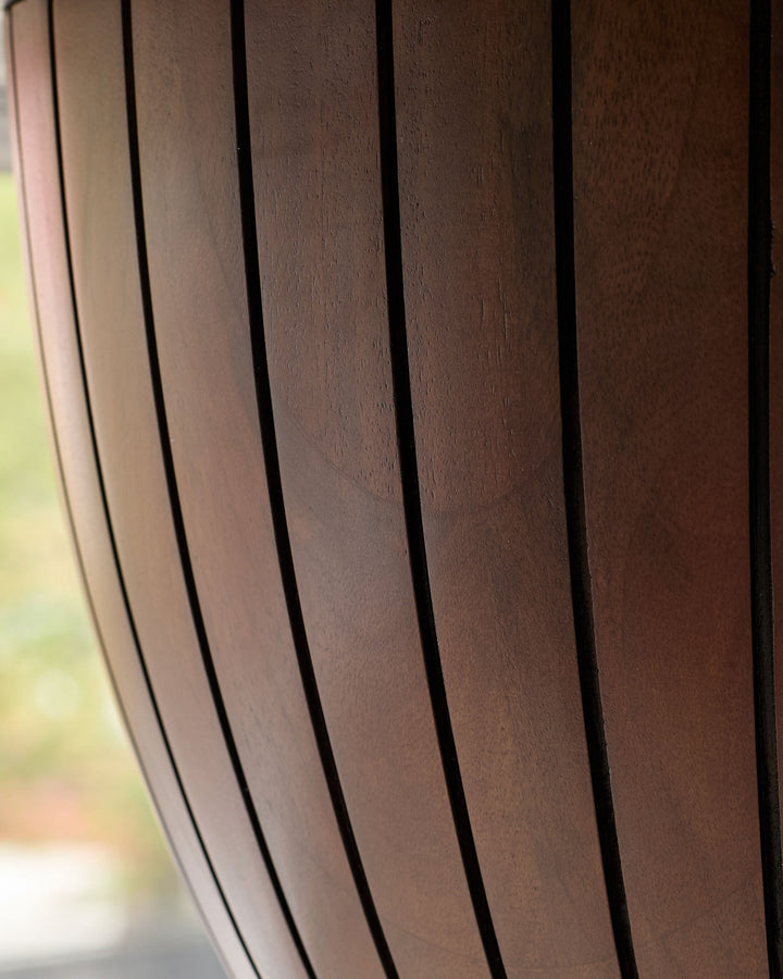 Close-up of dark mango wood slats showing rich brown grain and finish on dining table.