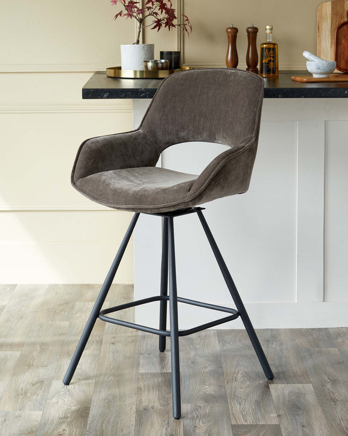A stylish grey bar stool with a curved back and black metal legs, perfect for modern kitchen islands.