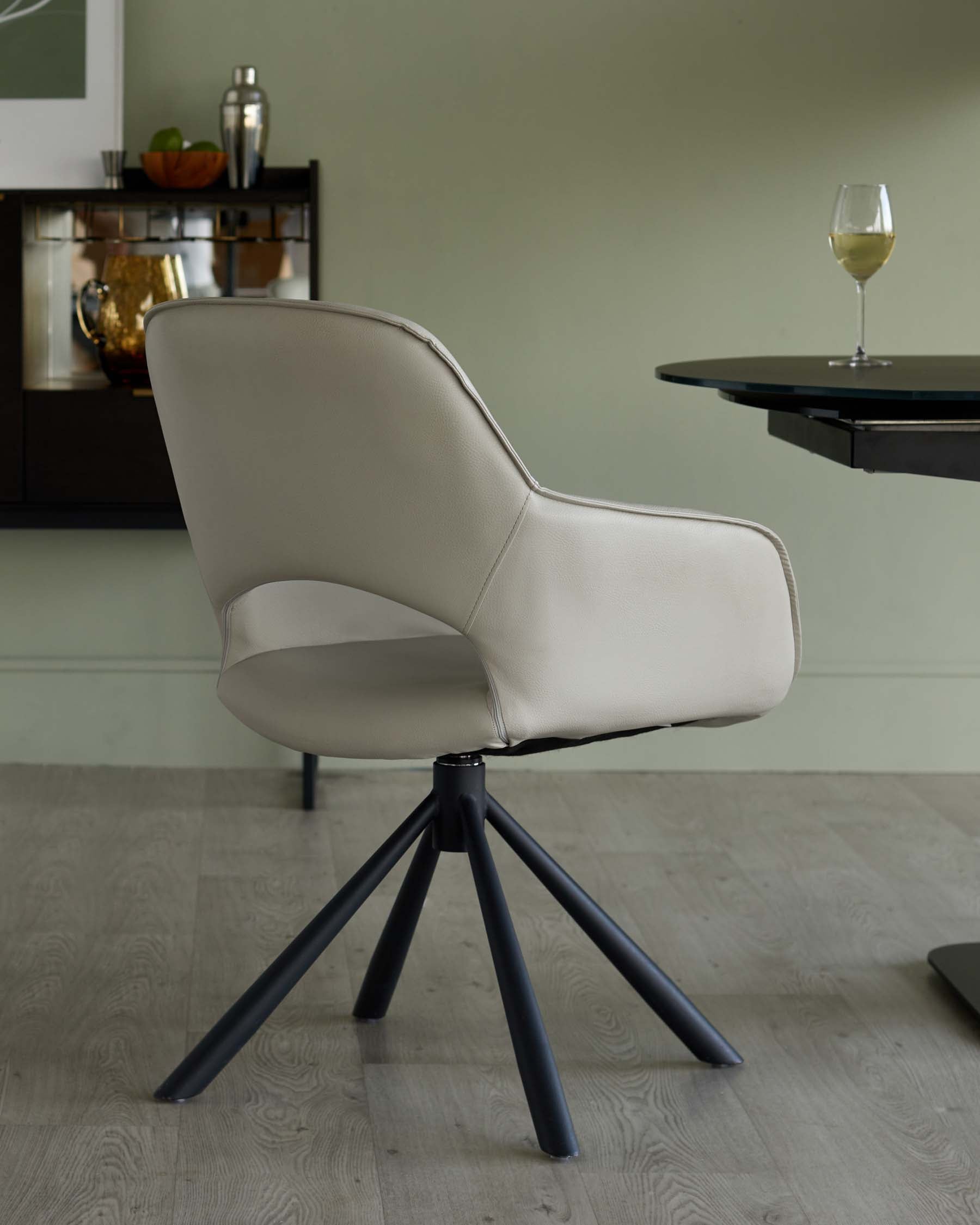 Marlow Light Grey Faux Leather Swivel Dining Armchair โ Danetti