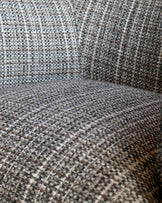 Close-up detail of dark chocolate velvet fabric on Miles occasional chair, showing texture and weave.