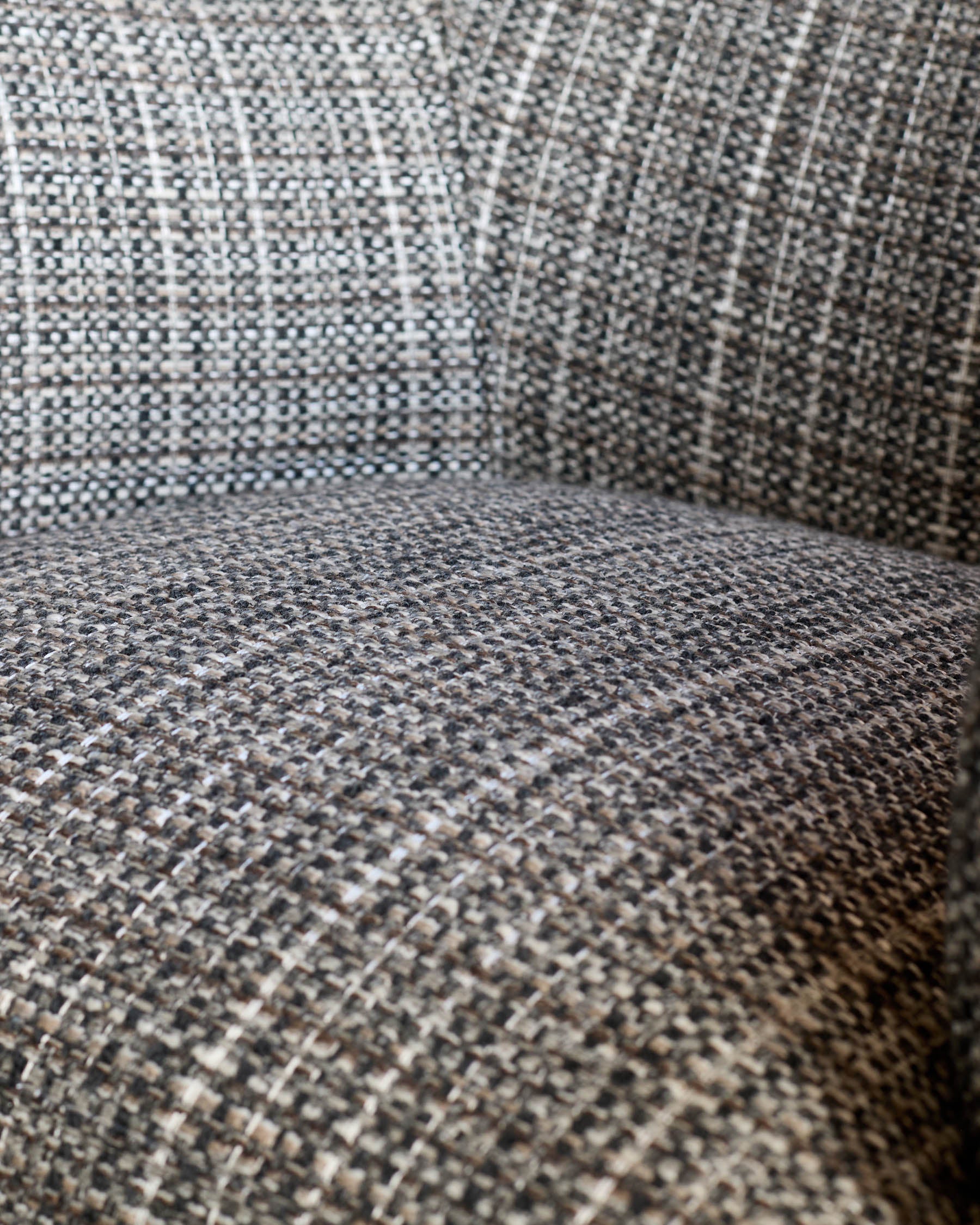 Close-up detail of dark chocolate velvet fabric on Miles occasional chair, showing texture and weave.