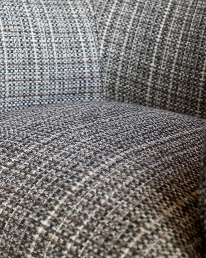 Close-up detail of dark chocolate velvet fabric on Miles occasional chair, showing texture and weave.