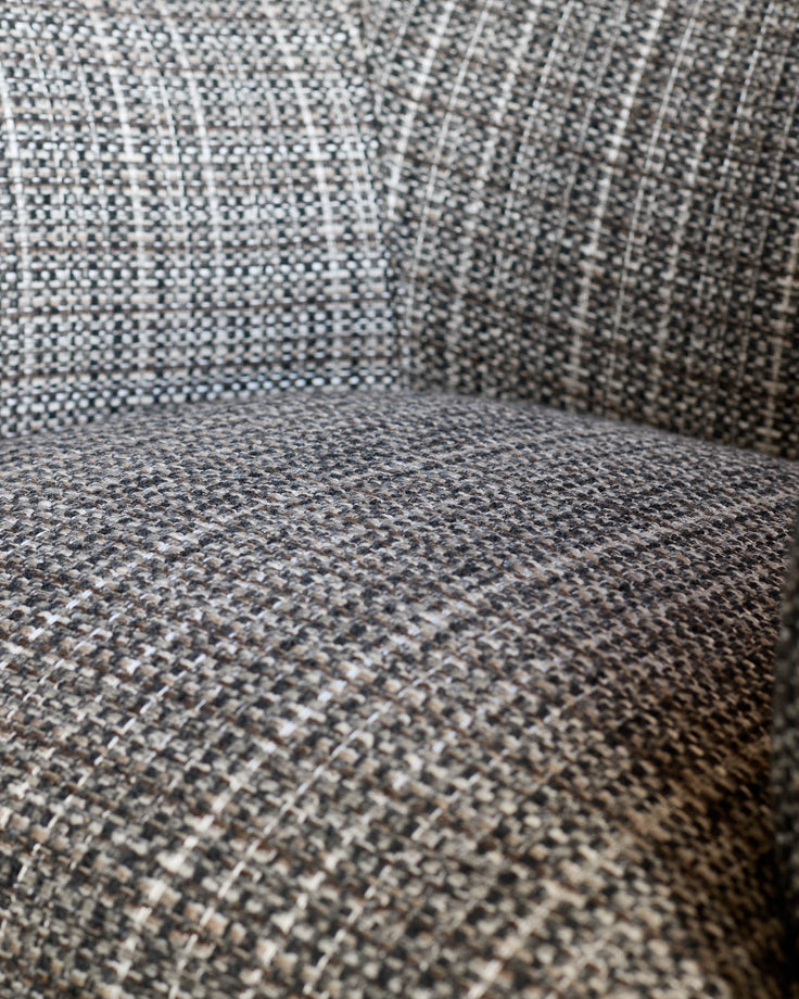 Close-up detail of dark chocolate velvet fabric on Miles occasional chair, showing texture and weave.