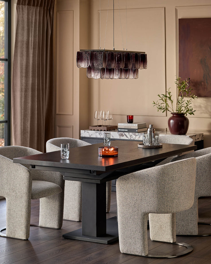 Morgan dark wood dining table, extended position, with beige upholstered chairs in modern dining room setting.