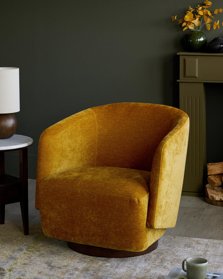 A plush, mustard-yellow swivel armchair adds warmth to this stylish living space featuring a side table and fireplace.