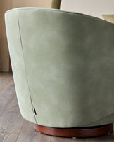 Natalia sage green faux leather swivel accent chair