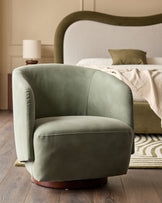 Natalia sage green faux leather swivel accent chair