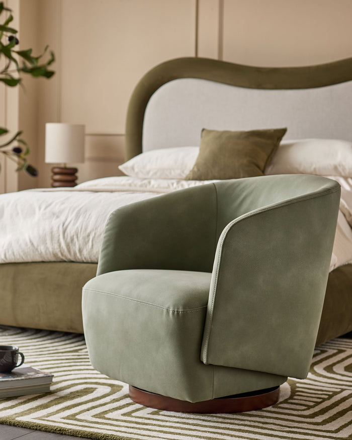 Natalia sage green faux leather swivel accent chair