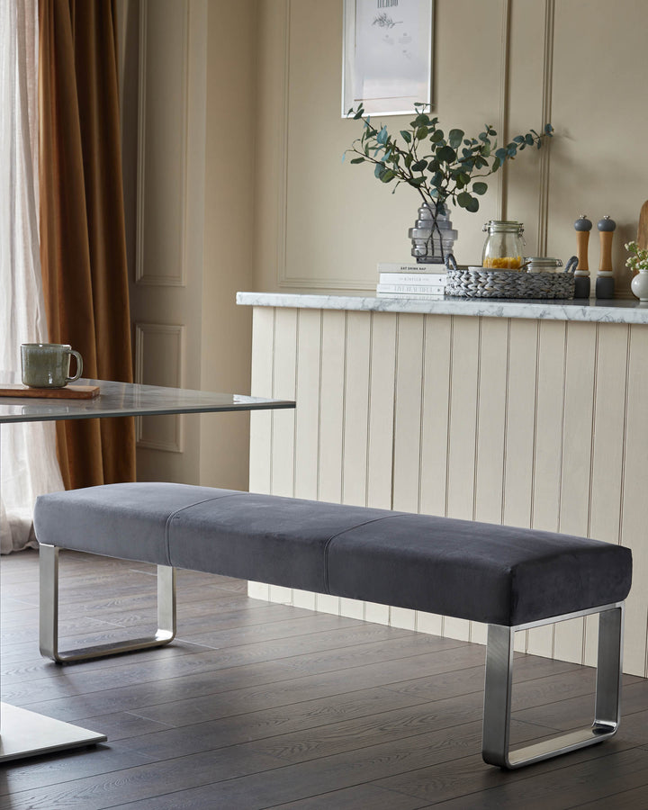 Contemporary grey bench with brushed steel legs. Stylish seating for the modern home.