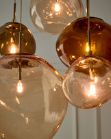 Orla mocha, caramel and champagne glass 8 bulb pendant light