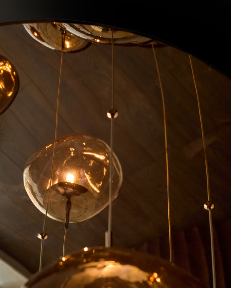 Orla mocha, caramel and champagne glass 8 bulb pendant light