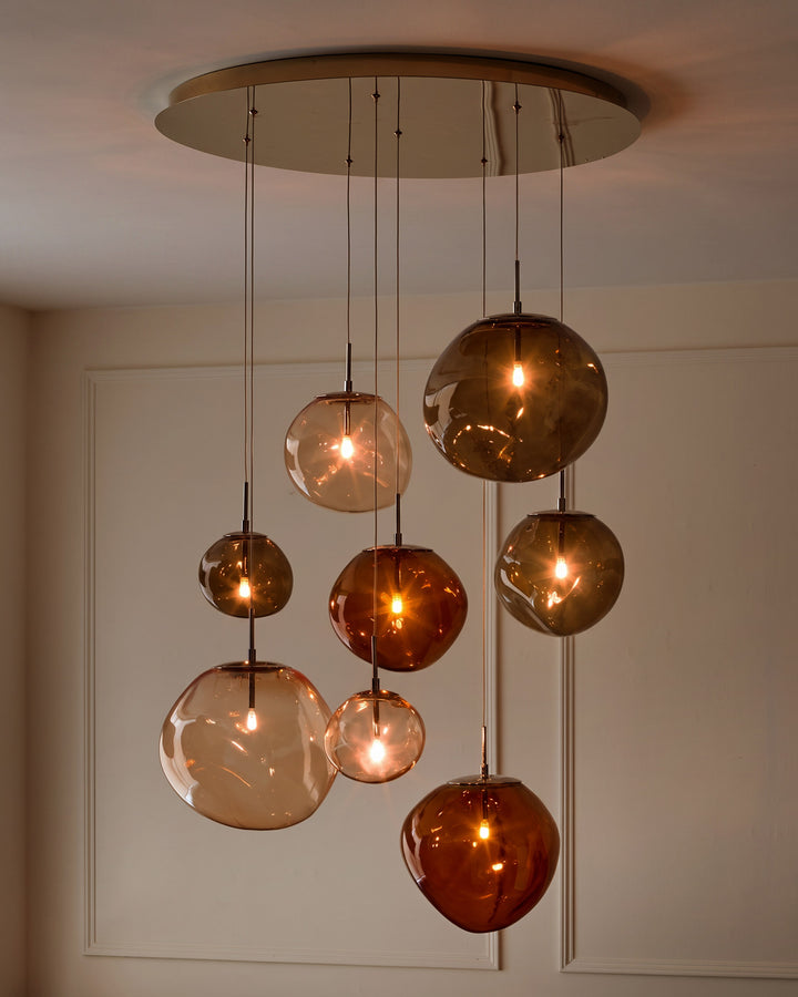 Orla mocha, caramel and champagne glass 8 bulb pendant light