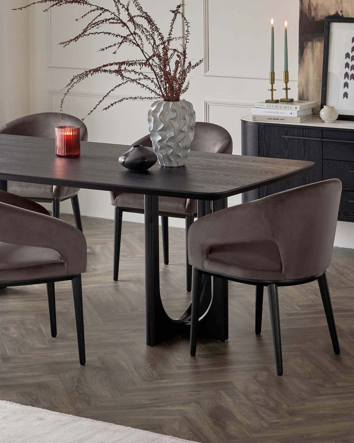 A modern dining set featuring a dark wooden table with an elegant grain finish and sturdy, block-style legs. Accompanied by four plush, armless dining chairs upholstered in a muted mink fabric, with a curved backrest and slender, tapered wooden legs.