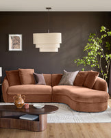 Apricot fabric right-hand corner chaise sofa with curved design, displayed in a modern living room setting.