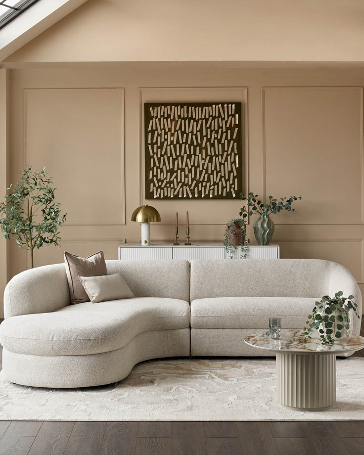 Ottilie left-hand corner chaise sofa in natural fabric, curved design, displayed in neutral living room setting.
