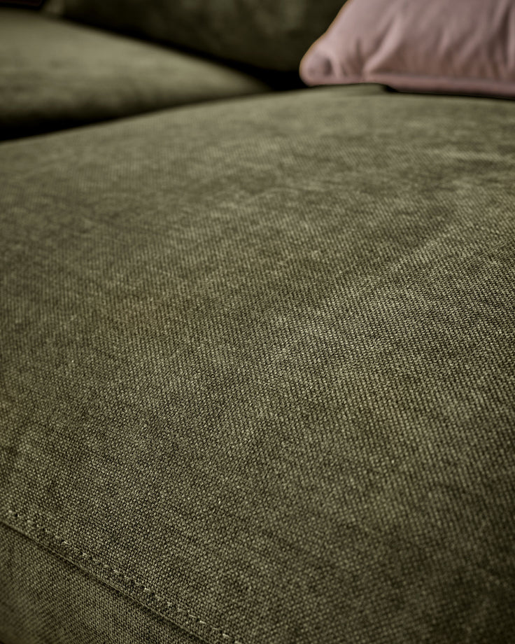 Close-up of olive green fabric texture on Ottilie left-hand corner chaise sofa, showing weave detail and soft upholstery.