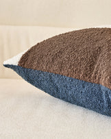 Harmony Cushion Medium in Navy - close-up of textured fabric showing color-block design with navy, cream, and brown sections.