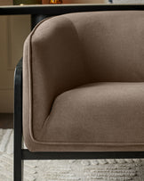 Palmer Occasional Chair in mocha fabric with curved back and black wooden frame, side view detail.