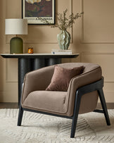 Palmer Occasional Chair in mocha fabric with black wooden legs, shown in a styled living room setting.