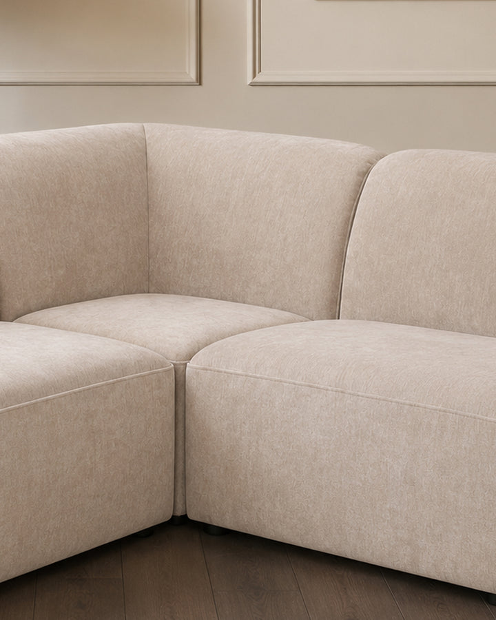 Penny champagne fabric large corner sofa