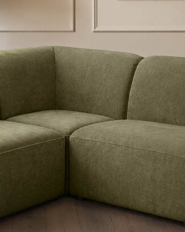 Penny dark green fabric large corner sofa