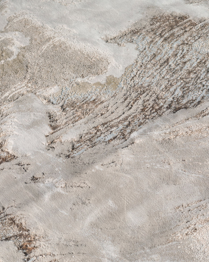 Perla Expression medium textured rug in silver, close-up showing detailed woven texture and tonal variations.