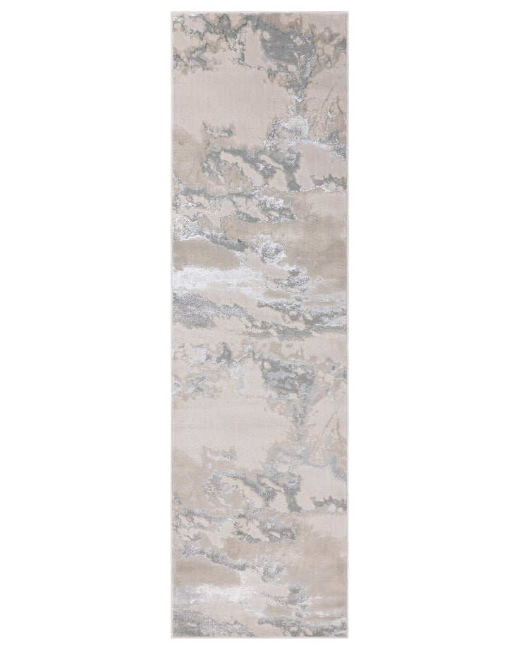 A long, patterned rug in neutral tones of beige, silver and cream. Marble effect design with a subtle sheen.