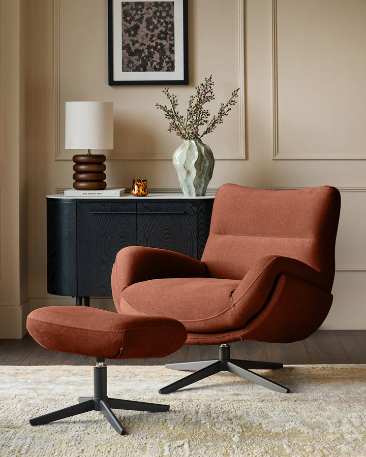 Piper accent chair with footstool in toffee red fabric, paired with matching ottoman on black swivel base in modern room setting.
