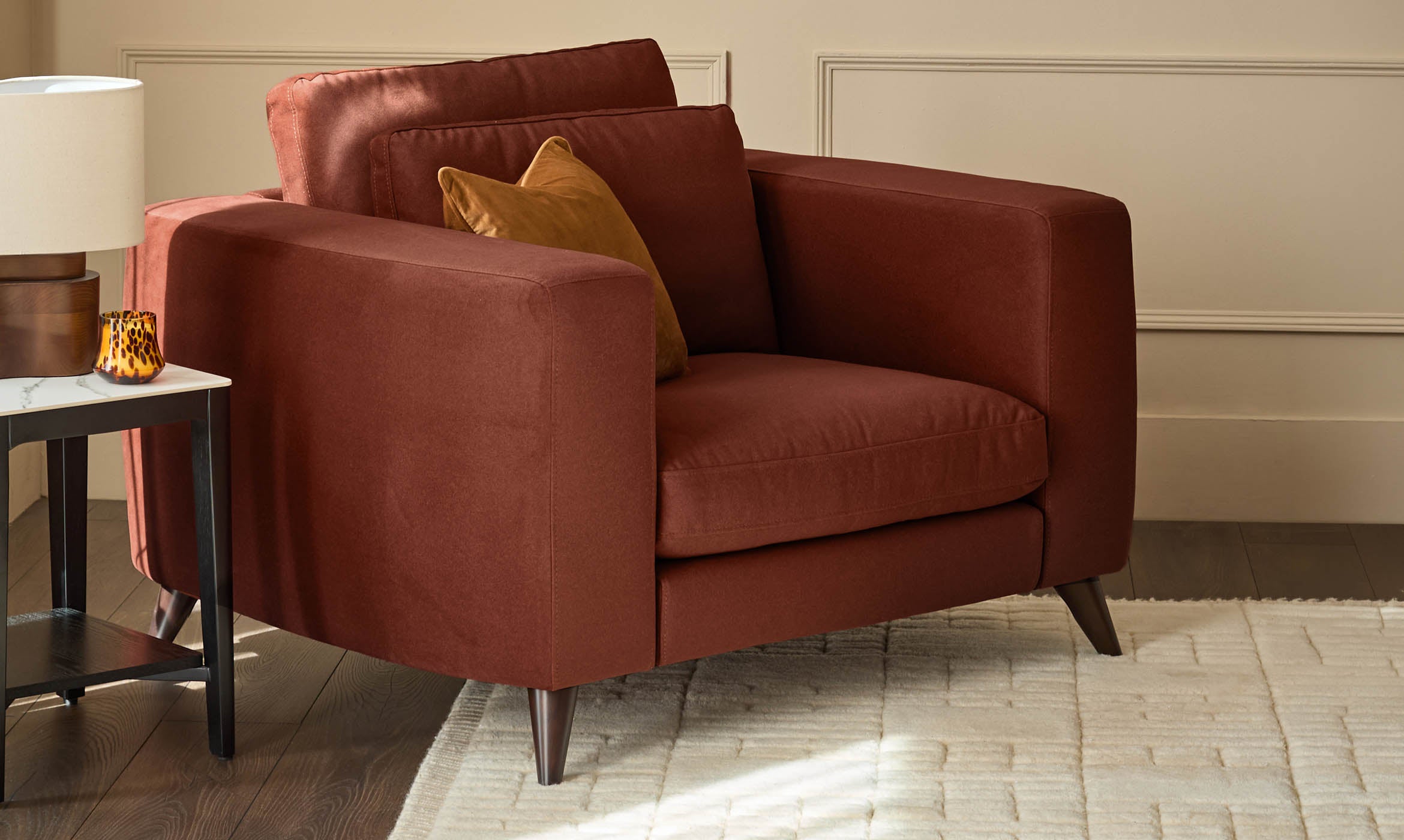 Quinn toffee red plush fabric black wood armchair