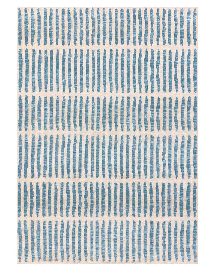 A patterned rug with blue vertical stripes on a cream background, ideal for adding texture and interest to any room.