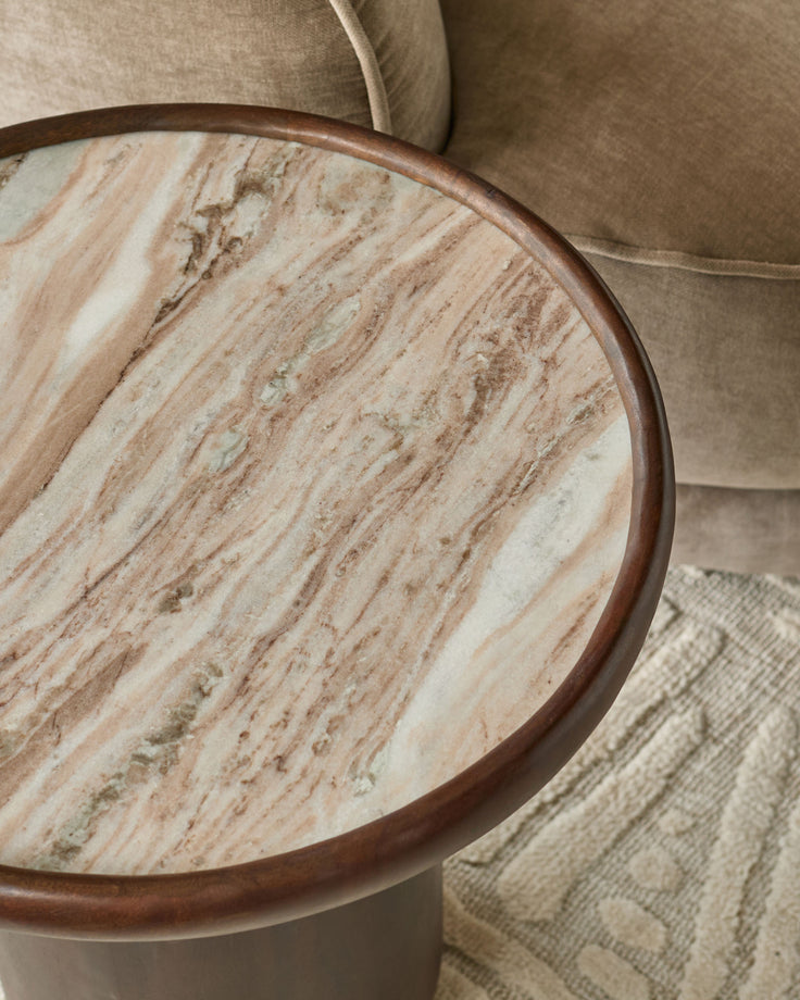 Rayna side table with dark wood frame and light marble top, viewed from above at an angle.
