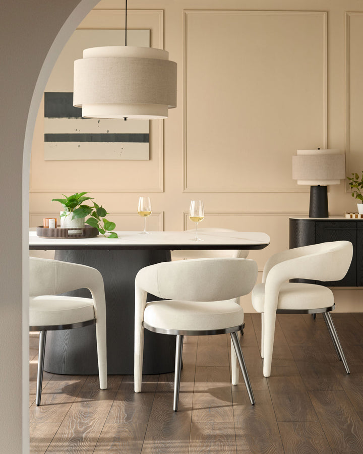 Leonie pendant light in natural linen and mocha finish, cylindrical drum shade suspended above dining table.