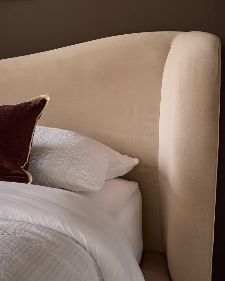 Rhiannon champagne velvet king size ottoman storage bed