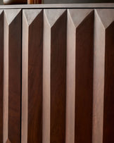 Dark mango wood sideboard with geometric fluted front panels and clean linear design details.