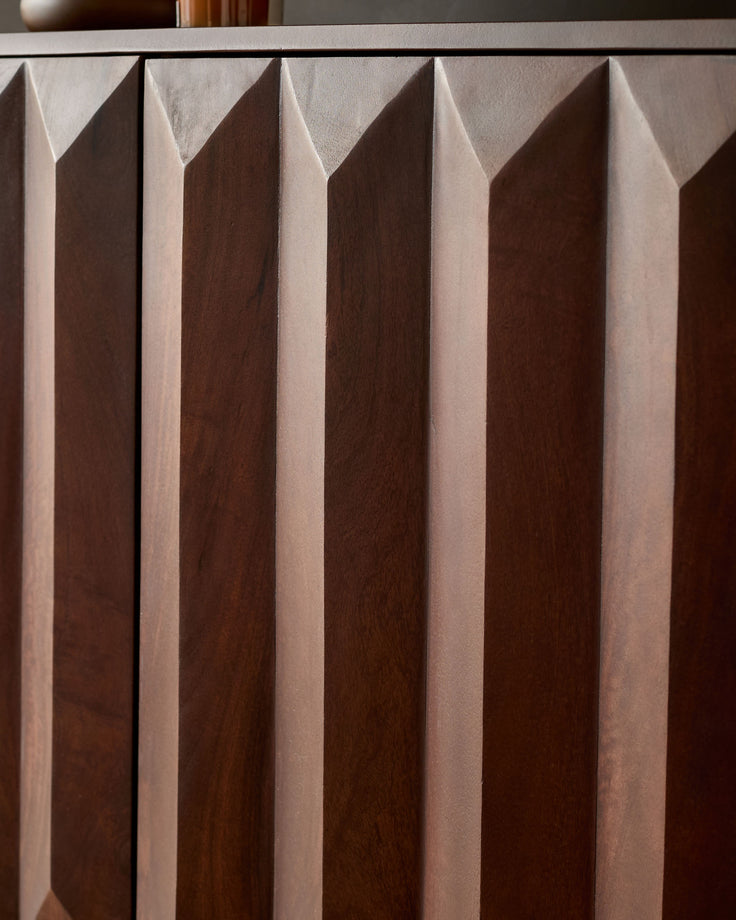 Dark mango wood sideboard with geometric fluted front panels and clean linear design details.