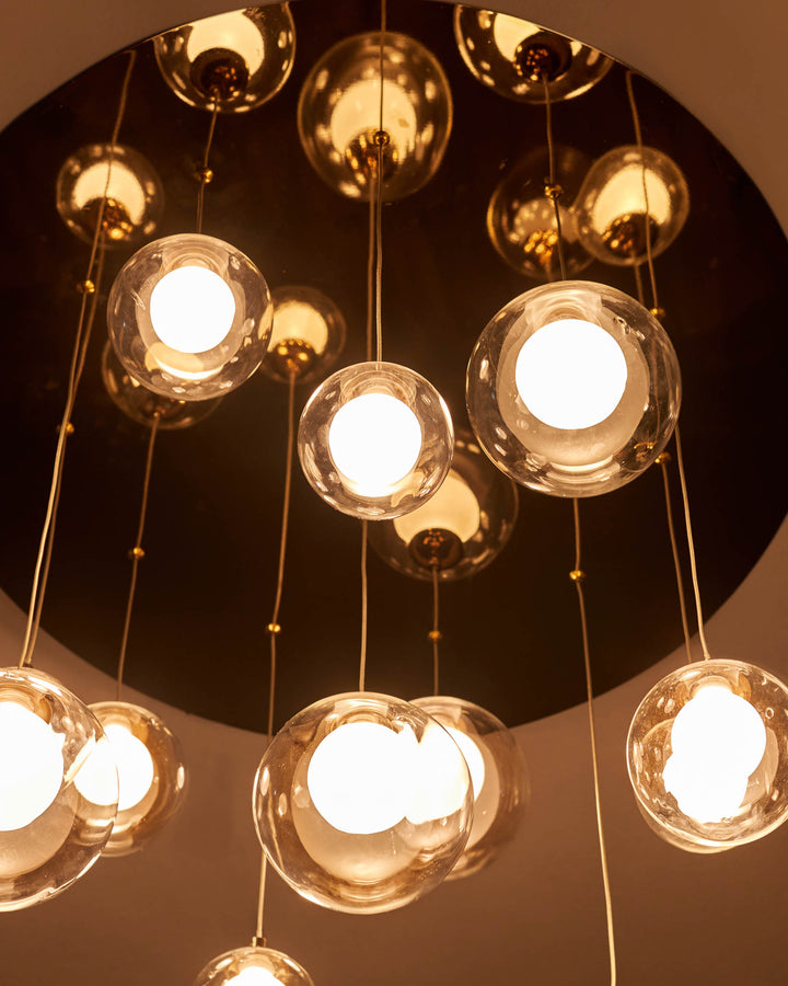 Contemporary chandelier with glass globes. Modern lighting for a stylish interior.