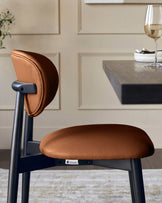 Ryann tan leather dining chair