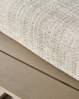 Close-up of natural linen upholstery on daybed with Grey wooden frame detail