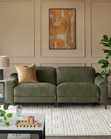 Serene 3-seater fabric recliner sofa in dark green, displayed in a neutral living room setting with decorative pillows and artwork.