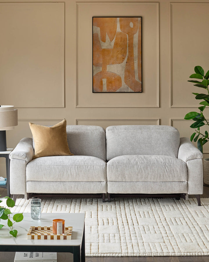Serene 3-seater light grey fabric recliner sofa with rolled arms and dark wooden legs, styled in a neutral living room.
