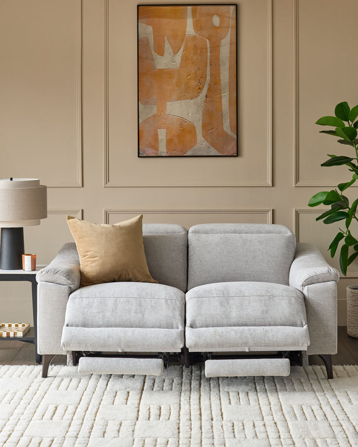 Serene 2-seater fabric recliner sofa in light grey with both recliners extended, displayed in a neutral living room setting.