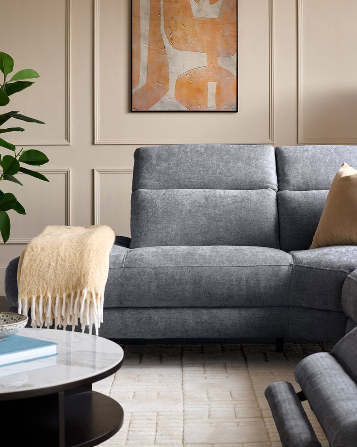 Serene Left Chaise Recliner Sofa in blue-grey chenille, shown in a modern living room setting with neutral decor.