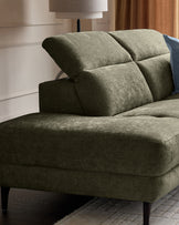 Serene left chaise recliner sofa in dark green chenille, angled side view showing plush cushions and tapered legs.