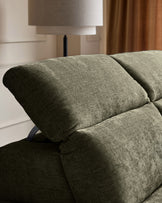 Serene right chaise recliner in dark green chenille, close-up of rolled armrest and cushioned seat detail.
