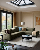 Serene right chaise recliner sofa in dark green chenille, displayed in a modern living room with reclined position visible.