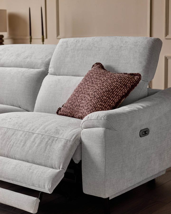 Light grey fabric left-corner recliner sofa with footrest extended, burgundy cushion, control panel visible on armrest.